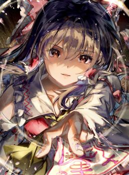 1girl bare_shoulders black_hair brown_hair collarbone commentary_request detached_sleeves hakurei_reimu highres holding holding_ofuda long_hair nanop38 ofuda red_shirt shirt solo touhou upper_body white_sleeves