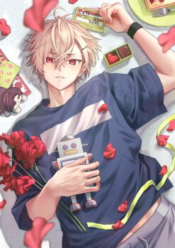 Rule 34 | 18trip, 1boy, absurdres, ahoge, blonde hair, blue shirt, bracelet, cake, candy, cassette tape, chocolate, chocolate heart, commentary request, earrings, flower, food, fork, green ribbon, grey pants, hair between eyes, heart, heart-shaped food, highres, holding, holding cassette, holding toy, jewelry, kurama ushio, looking at viewer, lying, male focus, midriff peek, on back, pants, parted lips, plate, red eyes, red flower, ribbon, robot, shirt, short hair, solo, stud earrings, sweatpants, tanu shigureni, toy