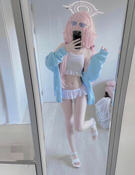 1girl ahoge bare_shoulders bikini blue_archive blue_jacket breasts cellphone cosplay cosplay_photo covering_face dal_(aazsxx2) eyewear_on_head frilled_bikini frills full_body hair_bobbles hair_ornament halo highres holding holding_phone hoshino_(blue_archive) hoshino_(swimsuit)_(blue_archive) indoors jacket long_hair low_twintails mirror mirror_selfie navel off_shoulder open_clothes open_jacket phone phone_over_face photo_(medium) sandals selfie small_breasts smartphone solo standing standing_on_one_leg sunglasses swimsuit twintails white_bikini