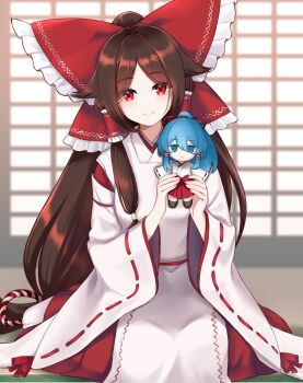 1girl absurdly_long_hair beikeice blue_eyes blue_hair bow brown_hair chihaya_(clothing) chinese_commentary closed_mouth detached_sleeves frilled_bow frilled_hair_tubes frills fumo_(doll) gensokyo's_first_hakurei_miko hair_bow hair_tubes highres holding holding_stuffed_toy huge_bow japanese_clothes kosode large_bow long_hair long_sleeves looking_at_viewer miko miyadeguchi_mizuchi miyadeguchi_mizuchi_(human) ponytail red_eyes ribbon-trimmed_sleeves ribbon_trim sitting smile solo stuffed_toy tatami touhou very_long_hair wariza wide_sleeves