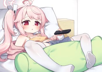 1girl ahoge blue_archive commentary_request controller halo holding kokone_(coconeeeco) long_hair natsu_(blue_archive) paid_reward_available pink_hair pink_halo red_eyes remote_control shorts side_ponytail solo thighhighs white_thighhighs