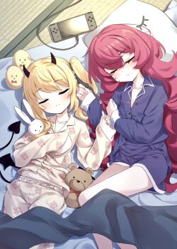 2girls black_horns black_wings blonde_hair blue_archive blush demon_girl demon_horns demon_tail demon_wings game_console highres horns ibuki_(blue_archive) iroha_(blue_archive) long_hair long_sleeves multiple_girls natsuki_(gedo) pajamas pillow red_hair ribbon side_ponytail sleeping stuffed_animal stuffed_toy tail tatami teddy_bear wings