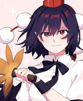 1girl black_bow black_bowtie black_hair black_wings bow bowtie commentary hat highres holding looking_at_viewer pointy_ears pom_pom_(clothes) red_eyes red_hat sakic43899 shameimaru_aya shirt short_hair smile solo tokin_hat touhou upper_body white_shirt wings