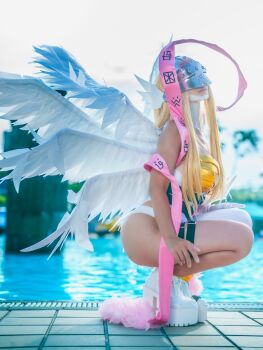 1girl absurdres angel_girl angel_wings angewomon angewomon_(cosplay) asymmetrical_clothes asymmetrical_legwear bare_shoulders blonde_hair breasts cosplay cosplay_photo covered_eyes digimon digimon_(creature) digimon_adventure feathered_wings female_focus head_wings helmet helmet_over_eyes high_heel_shoes highres lips luna_kamijo multiple_wings outdoors photo_(medium) pink_shawl poolside shawl thigh_strap water wings