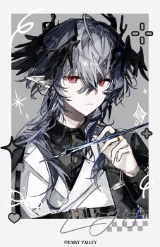 1boy absurdres ahoge arknights black_shirt black_wings border buqiyong buttons character_name chinese_commentary commentary_request earrings grey_background grey_hair hair_between_eyes hair_over_shoulder hand_up head_wings highres holding holding_pen jewelry logos_(arknights) long_hair long_sleeves looking_at_viewer male_focus mole mole_under_eye nib_pen_(object) pen pointy_ears polaroid_photo ring shirt solo sparkle strap upper_body vest white_vest wings