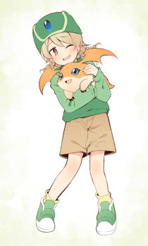 Rule 34 | 1girl, blue eyes, brown eyes, brown hair, brown shorts, brown socks, commentary request, cosplay, creature, crossover, digimon, digimon (creature), digimon adventure, full body, green hat, green shirt, green shoes, hat, holding, holding creature, holding digimon, hug, idolmaster, idolmaster cinderella girls, long hair, long sleeves, morikubo nono, one eye closed, patamon, revision, ringlets, shirt, shoes, shorts, simple background, socks, standing, takaishi takeru, takaishi takeru (cosplay), uccow