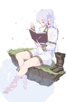 1girl barefoot book boots capelet closed_mouth commentary dress earrings elf frieren full_body grass green_eyes grey_hair highres holding holding_book jewelry kaneko_ryou long_hair long_sleeves on_grass on_ground open_book pointy_ears reading short_dress simple_background sitting soaking_feet solo sousou_no_frieren teardrop_earrings thighs twintails unworn_boots water white_background white_capelet white_dress