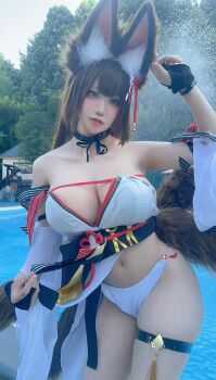 1girl absurdres amagi_(azur_lane) amagi_(wending_waters_serene_lotus)_(azur_lane) animal_ears azur_lane bikini breasts brown_hair fake_animal_ears fingerless_gloves fox_ears fox_tail gloves highres hikimayu japanese_(nationality) pool poolside real_life swimsuit tail thigh_strap water white_bikini