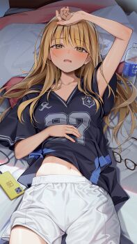 1girl black_shirt blonde_hair blush brand_name_imitation breasts cellphone charging_device collarbone commentary_request fang fujita_kotone gakuen_idolmaster glasses highres idolmaster kainown long_hair looking_at_viewer lying medium_breasts midriff_peek on_back on_bed open_mouth phone pink_nails plastic_bottle pocari_sweat shirt shorts smartphone solo straight_hair unworn_eyewear white_shorts