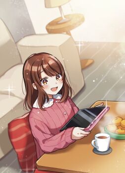 1girl :d blush brown_hair character_request collared_shirt commentary_request contrast_collar couch cup food fruit highres holding holding_tablet_pc indoors long_hair long_sleeves mandarin_orange mug official_art open_mouth pink_shirt shinishi_chiho shinken-zemi shirt sitting smile solo sparkle table tablet_pc upper_body