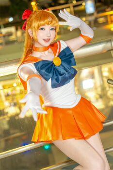 aino_minako bishoujo_senshi_sailor_moon blonde_hair blue_eyes bow cosplay cosplay_photo gloves h_kagetu highres long_hair looking_at_viewer miniskirt photo_(medium) real_life red_bow sailor_venus sailor_venus_(cosplay) short_sleeves skirt