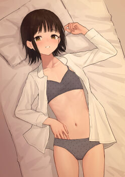 1girl absurdres bra brown_eyes brown_hair choppy_bangs cowboy_shot flat_chest grey_bra grey_panties hand_on_own_stomach hand_up head_on_pillow highres itsuki_nofuji looking_at_viewer lying medium_hair navel no_pants on_back on_bed open_mouth original panties parted_lips pillow polka_dot polka_dot_bra polka_dot_panties shirt smile solo stomach underwear white_shirt