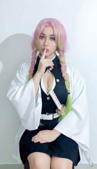 1girl absurdres ariacosplay breasts cleavage cosplay cosplay_photo demon_slayer_uniform female_focus finger_to_mouth gradient_hair green_eyes green_hair highres indoors japanese_clothes kanroji_mitsuri kanroji_mitsuri_(cosplay) kimetsu_no_yaiba large_breasts long_hair matching_hair/eyes multicolored_hair photo_(medium) pink_hair real_life solo two-tone_hair