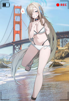 1girl absurdres asuna_(blue_archive) battery_indicator bikini black_choker blonde_hair blue_archive blue_eyes blue_halo blue_sky breasts bridge choker commentary_request diamond-shaped_pupils diamond_(shape) double_bikini gem golden_gate_bridge halo heart highres large_breasts navel outdoors photo_background recording sandals siwa_(st_ekfrlfkep) sky smile solo spoken_heart swimsuit symbol-shaped_pupils toes water white_background white_bikini