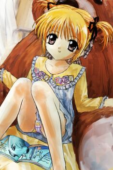 1girl 2000s_(style) 2fulun blonde_hair book brown_eyes commentary english_commentary english_text faux_retro_artstyle highres long_sleeves looking_at_viewer open_book original panties print_panties puritan_collar short_hair sitting smile solo twintails underwear