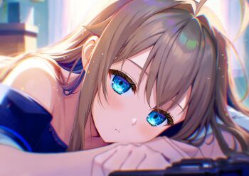 1girl absurdres ahoge aoe_ui bare_shoulders blue_eyes blush brown_hair chromatic_aberration closed_mouth commentary_request highres indoors long_hair looking_at_viewer lying on_stomach original portrait solo twitter_username