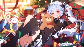 1girl absurdres ahoge artist_name black_thighhighs bow bowtie box character_request christmas_ornaments christmas_tree commission copyright_request gift gift_box highres holding holding_stuffed_toy long_hair one_eye_closed open_box red_bow red_bowtie red_eyes single_thighhigh smile star_(symbol) stuffed_animal stuffed_toy teddy_bear thighhighs twitter_username vgen_commission weiic