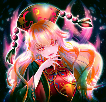 1girl beads black_background black_dress black_hat chinese_clothes commentary_request crescent crescent_print dalachi_(headdress) dress energy fingernails hair_between_eyes hand_up hat highres junko_(touhou) long_hair long_sleeves looking_at_viewer mandarin_collar mizuki_ruri neck_ribbon open_mouth orange_hair petals phoenix_print pink_lips red_eyes red_tabard ribbon simple_background smile solo sparkle tabard tassel teeth touhou upper_body wavy_hair wide_sleeves yellow_ribbon