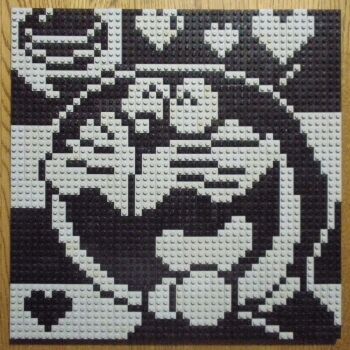 Rule 34 | ^ ^, blinking inside eyes, closed eyes, doraemon, doraemon (character), heart, high contrast, highres, lego, lego (medium), monochrome, no humans, open mouth, photo (medium), pixel art, smile, solo, speech bubble, striped background, tongue, unconventional media, you rei (blowback)