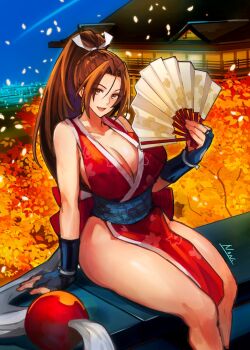 1girl artist_name brown_eyes brown_hair fatal_fury female_focus floral_print folding_fan hand_fan high_ponytail highres holding holding_fan japanese_clothes looking_at_viewer lower_teeth_only matching_hair/eyes motoyui non_kujoe obi open_mouth pelvic_curtain ponytail revealing_clothes sash shiranui_mai sitting smile snk solo teeth