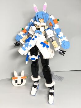 Rule 34 | 1girl, animal ears, black gloves, black pantyhose, blue hair, carrot hair ornament, dress, food-themed hair ornament, full body, gloves, hair ornament, highres, hololive, lego (medium), nanoka boozu, orange eyes, pantyhose, pekomon (usada pekora), photo (medium), rabbit ears, solo, standing, thigh strap, twintails, unconventional media, usada pekora, virtual youtuber, white dress