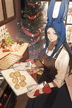 1girl absurdres animal_ears baking baking_sheet blue_hair box christmas_tree collared_shirt commentary_request cup final_fantasy final_fantasy_xiv gift gift_box gloves highres indoors long_hair looking_at_viewer oven_mitts parted_lips shirt solo spoon tochigi_1990 viera warrior_of_light_(ff14) white_shirt yellow_eyes