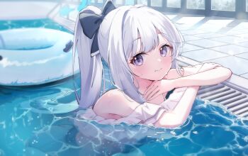 1girl blue_archive blue_bow blue_eyes blue_halo bow commentary hair_bow halo high_ponytail highres innertube long_hair looking_at_viewer looking_to_the_side miyako_(blue_archive) miyako_(swimsuit)_(blue_archive) official_alternate_costume partially_submerged ponytail pool poolside smile solo swim_ring tomo_(tomosa011326) white_hair