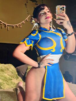1girl ass black_hair breasts capcom cell cellphone chun-li chun-li_(cosplay) cosplay hair_ornament highres large_breasts nipples phone real_life selfie smile solo street_fighter