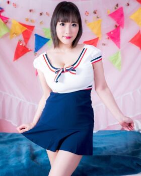 1girl breasts brown_eyes brown_hair clothes_grab female_focus highres large_breasts looking_at_viewer medium_hair model photo_(medium) real_life shibuya_kaho smile solo