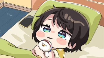 1girl bed black_hair blue_eyes blush_stickers brown_shirt cellphone chibi commentary_request hololive hugging_object indoors lying mochimiko on_back oozora_subaru parted_lips phone pillow shirt short_sleeves solo under_covers virtual_youtuber