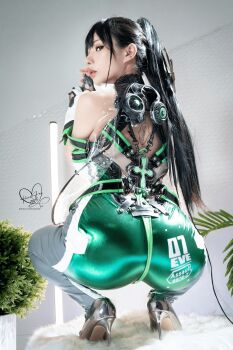 1girl absurdres ass black_hair cosplay cosplay_photo eve_(stellar_blade) eve_(stellar_blade)_(cosplay) female_focus hane_ame highres long_hair photo_(medium) planet_diving_suit_(7th)_(stellar_blade) ponytail real_life solo stellar_blade