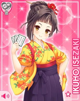 Rule 34 | 1girl, black hakama, blunt bangs, brown eyes, brown hair, card (medium), character name, floral print, flower, flower symbol, girlfriend (kari), hair bun, hair flower, hair ornament, hair stick, hakama, hand on own hip, holding, isezaki ikuho, japanese clothes, kanzashi, karuta (card game), kimono, looking at viewer, official art, pink background, qp:flapper, red flower, ribbon, smile, solo, tasuki, uta-garuta