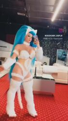 1girl animal_ears animated bare_shoulders blowing_kiss blue_hair breasts cat_ears cat_tail cellphone cosplay crashcandy_cosplay darkstalkers felicia_(darkstalkers) felicia_(darkstalkers)_(cosplay) highres large_breasts long_hair phone real_life tagme tail very_long_hair video white_fur