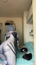 1girl all_fours animated ass ayanami_rei bed bed_sheet bedroom black_eyes blanket blue_hair bodysuit brazilian_(nationality) breasts brown_eyes cabinet cameltoe cat ceiling chibi cosplay cosplay_photo crawling doll doorway expressionless female_focus fumo_(doll) holding holding_stuffed_toy indoors interface_headset_(evangelion) looking_at_viewer lowres medium_breasts neon_genesis_evangelion nerokosplayer on_bed photo_(medium) real_life shelf short_hair skin_tight solo sound standing stuffed_toy translucent video white_bodysuit wig