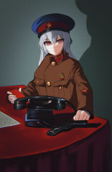 1girl absurdres alternate_costume badge breast_pocket buttons commentary corded_phone english_commentary girls&#039;_frontline gun hair_between_eyes hammer_and_sickle handgun hat highres jacket long_hair looking_at_viewer military_hat military_jacket military_uniform nkvd peaked_cap phone pistol pk-971 pocket red_eyes red_star semi-automatic_pistol shadow smile soviet star_(symbol) table tokarev_(girls&#039;_frontline) tokarev_tt-33 weapon