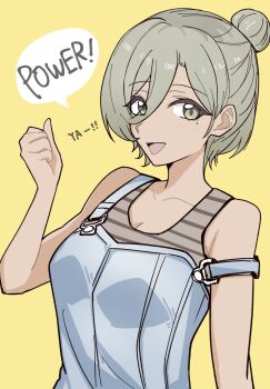 1girl blue_overalls blush breasts brown_eyes brown_hair brown_tank_top cleavage commentary english_text girls_band_cry hair_between_eyes hair_bun hand_up highres long_hair_between_eyes mole mole_under_eye multicolored_hair n_nai_nai_n open_mouth overalls roots_(hair) rupa_(girls_band_cry) simple_background single_hair_bun solo striped_tank_top tank_top upper_body yellow_background
