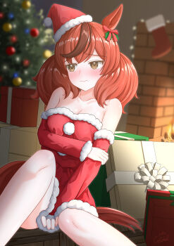 1girl absurdres animal_ears bare_shoulders blush bow breasts brown_eyes brown_hair christmas christmas_ornaments christmas_stocking christmas_tree cleavage collarbone commentary_request detached_sleeves dress ear_bow ear_ribbon fire fireplace fur-trimmed_dress fur-trimmed_headwear fur_trim gamel_120 hat highres horse_ears horse_girl horse_tail medium_breasts medium_hair multicolored_hair nice_nature_(umamusume) red_dress red_hat santa_costume santa_dress santa_hat solo strapless strapless_dress streaked_hair tail twintails umamusume