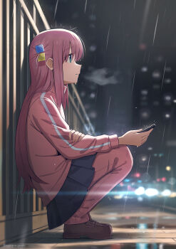 1girl absurdres against_railing black_skirt blue_eyes blurry blurry_background bocchi_the_rock! brown_shoes cellphone commentary_request full_body gotoh_hitori hair_ornament hanagami_gendai highres holding holding_phone jacket lens_flare long_hair night outdoors pants parted_lips phone pink_hair pink_jacket pink_pants pleated_skirt railing rain shoes skirt smartphone solo squatting track_jacket track_pants track_suit
