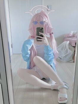 1girl ahoge bare_shoulders bikini blue_archive blue_jacket breasts cellphone cosplay covering_face dal_(aazsxx2) eyewear_on_head frilled_bikini frills full_body hair_bobbles hair_ornament halo highres holding holding_phone hoshino_(blue_archive) hoshino_(swimsuit)_(blue_archive) indoors jacket long_hair low_twintails mirror mirror_selfie off_shoulder open_clothes open_jacket phone phone_over_face photo_(medium) sandals selfie sitting small_breasts smartphone solo sunglasses swimsuit twintails white_bikini