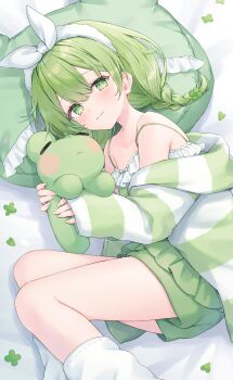 1girl bare_shoulders blush bow_hairband braid closed_mouth commentary commission double-parted_bangs feet_out_of_frame green_eyes green_hair green_shorts green_sweater hairband head_on_pillow highres holding holding_stuffed_toy long_hair long_sleeves looking_at_viewer lying off_shoulder on_side original pillow shano_hiyori shorts skeb_commission smile socks solo striped_clothes striped_sweater stuffed_animal stuffed_frog stuffed_toy sweater white_hairband white_socks