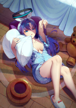 1girl baschyf blue_archive blue_eyes blue_hair breasts hair_ribbon halo highres long_hair looking_at_viewer lying mechanical_halo medium_breasts on_back pajamas parted_lips pillow pointing pointing_up ribbon sleepwear slippers solo stuffed_animal stuffed_toy teddy_bear yuuka_(blue_archive)