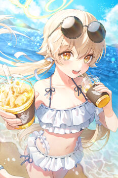 1girl :d bare_shoulders beach bikini blonde_hair blue_archive blue_sky blush cloud collarbone commentary_request cup day disposable_cup drink drinking_straw eyelashes eyewear_on_head floating_hair frills hair_between_eyes hair_ornament hair_ribbon halo halterneck hands_up hifumi_(blue_archive) hifumi_(swimsuit)_(blue_archive) highres holding holding_cup ice ice_cube light_particles long_hair looking_at_viewer low_twintails mountain mountainous_horizon navel ocean official_alternate_costume open_mouth outdoors peroro_(blue_archive) plus1024 ribbon round_eyewear ruffle_bikini sand side-tie_bikini_bottom sidelocks sky smile solo sparkle standing stomach sunglasses swimsuit teeth twintails upper_teeth_only water white_bikini white_ribbon yellow_eyes