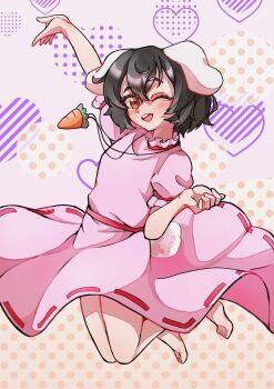 1girl ;d absurdres animal_ears arm_up bare_arms bare_legs barefoot black_hair blush carrot_necklace commentary dress frilled_sleeves frills hair_between_eyes heart heart_background highres inaba_tewi jewelry jumping looking_at_viewer lop_rabbit_ears necklace one_eye_closed open_mouth pink_dress puffy_short_sleeves puffy_sleeves rabbit_ears rabbit_girl rabbit_tail red_eyes short_hair short_sleeves smile solo suzukiairi0001 tail teeth toes touhou upper_teeth_only