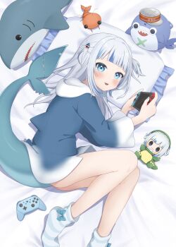 Rule 34 | 1girl, absurdres, aka tadaima, ass, bloop (gawr gura), blue eyes, blunt bangs, bow legwear, character doll, commentary request, dinosaur costume, doll, fins, fish tail, game controller, gawr gura, gawr gura (1st costume), handheld game console, head on pillow, highres, holding, holding handheld game console, hololive, hololive english, hood, hood down, lying, medium hair, nintendo switch, nintendo switch pro controller, on side, pillow, shark tail, sharp teeth, socks, stitched tail, striped clothes, striped socks, stuffed animal, stuffed shark, stuffed shrimp, stuffed toy, tail, teeth, two side up, upper teeth only, virtual youtuber