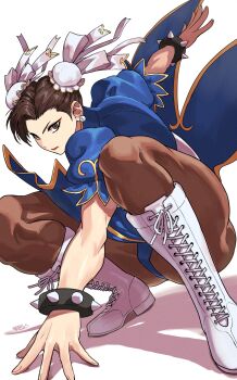 1girl black_hair boots bracelet breasts brown_eyes brown_hair bun_cover capcom china_dress chinese_clothes chun-li commentary_request double_bun dress earrings fighting_stance hair_bun highres jewelry lace-up_boots large_breasts looking_at_viewer makeup pantyhose pelvic_curtain ryo_yo_shi serious solo spiked_bracelet spikes squatting street_fighter street_fighter_ii_(series) thick_thighs thighs