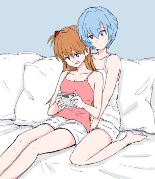 2girls ayanami_rei barefoot between_legs blue_background blue_eyes camisole clenched_teeth closed_mouth commentary_request controller game_controller holding holding_controller holding_game_controller interface_headset_(evangelion) multiple_girls mutsu_(layergreen) neon_genesis_evangelion orange_hair pink_camisole red_eyes shorts sitting souryuu_asuka_langley teeth wariza white_camisole white_shorts yuri