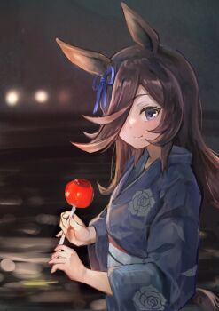1girl absurdres animal_ears aoniyoshi blue_kimono blue_ribbon blush bow brown_hair candy_apple closed_mouth commentary_request ear_ribbon flipped_hair floral_print floral_print_kimono food hair_over_one_eye highres holding holding_candy_apple holding_food horse_ears horse_girl horse_tail japanese_clothes kimono long_hair looking_at_viewer obi print_kimono purple_eyes ribbon rice_shower_(umamusume) sash smile solo tail umamusume