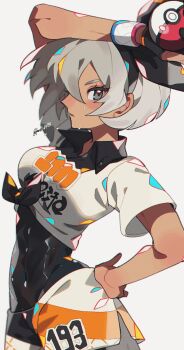 1girl arm_up bea_(pokemon) black_bodysuit blush bodysuit bodysuit_under_clothes breasts collared_shirt commentary_request covered_abs dynamax_band eyelashes gloves grey_eyes grey_hair hand_on_own_hip highres holding holding_poke_ball kawasaki_(kwsk_8765) looking_at_viewer nintendo poke_ball poke_ball_(basic) pokemon pokemon_swsh print_shirt print_shorts shirt short_sleeves shorts sideways_glance simple_background single_glove solo tied_shirt twitter_username white_background white_shirt
