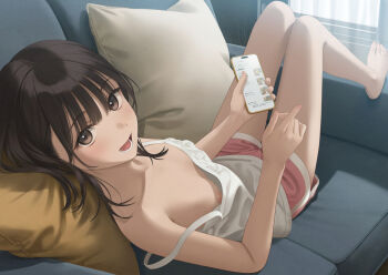 1girl :d barefoot black_hair blunt_bangs camisole cellphone commentary_request couch head_on_pillow highres holding holding_phone indoors knees_up looking_at_viewer looking_back lying nipple_slip nipples on_back on_couch open_mouth original phone pillow pink_shorts shorts smartphone smile solo spaghetti_strap strap_slip thighs tongue variant_set white_camisole yukishima_momo