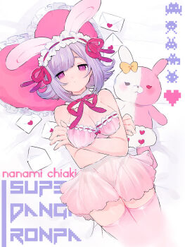 Rule 34 | 1girl, animal ears, arms under breasts, babydoll, breasts, character doll, character name, closed mouth, commentary request, copyright name, crossed arms, danganronpa (series), danganronpa 2: goodbye despair, doll, envelope, expressionless, fake animal ears, hairband, heart, heart-shaped pillow, highres, large breasts, lolita hairband, looking at viewer, lying, miyako (xxxbibit), monomi (danganronpa), nanami chiaki, on back, pillow, pink babydoll, pink eyes, pink thighhighs, pixel art inset, purple hair, ribbon, short hair, solo, stuffed toy, thighhighs